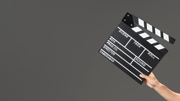 Hand with movie slate