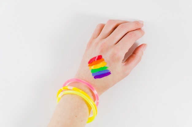 Free photo hand with a painted pride flag