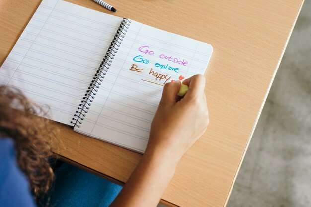 Hand writing with marker on the notebook