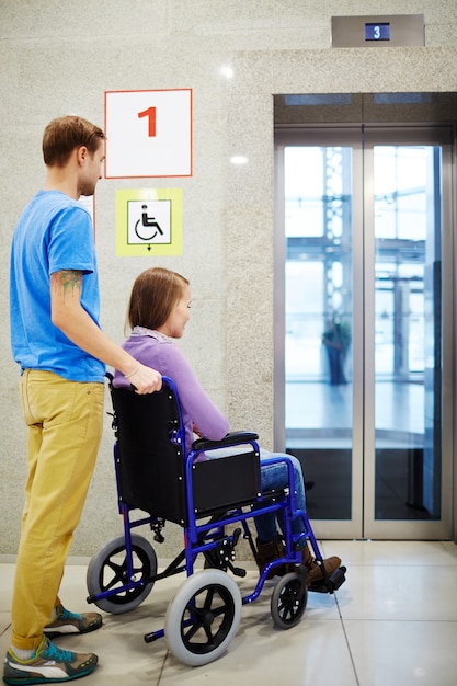 Handicapped waiting for elevator