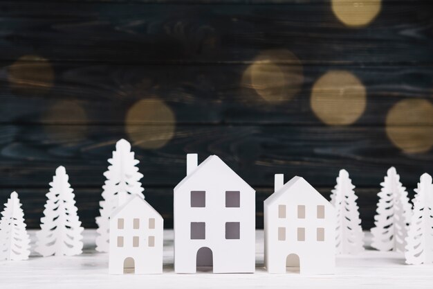 Handmade paper houses and fir trees