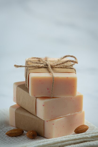 Handmade soap almond on marble background