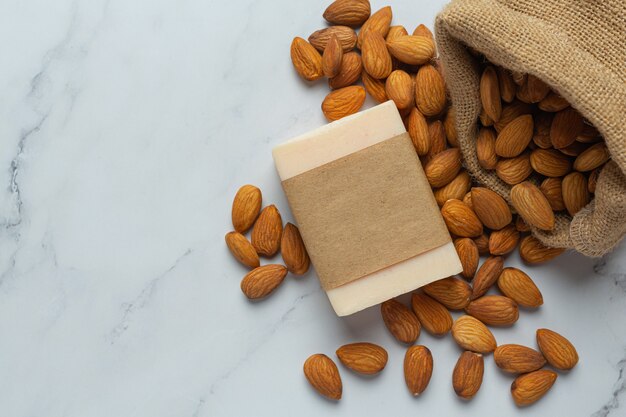 Handmade soap almond on marble background