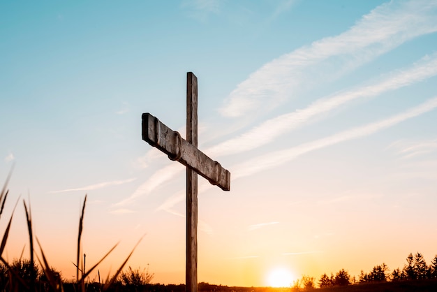 A handmade wooden cross over sky