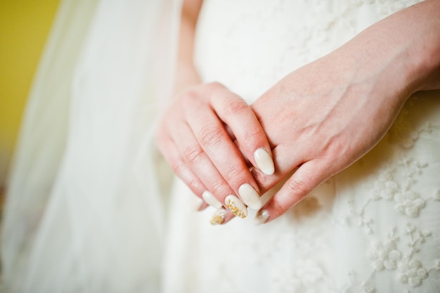 Hands of bride