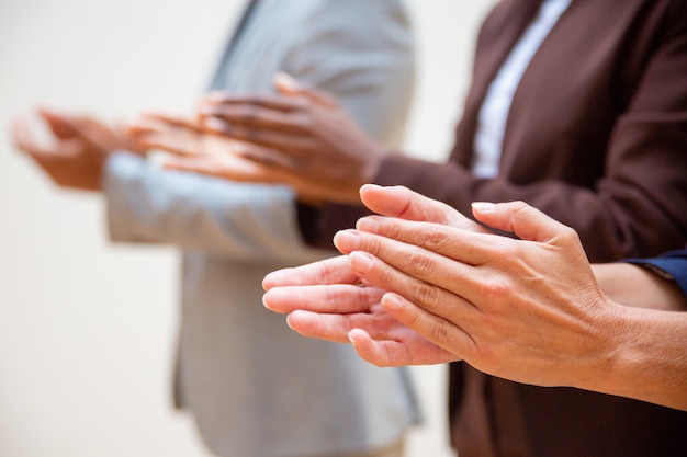 Hands of business people applauding speaker