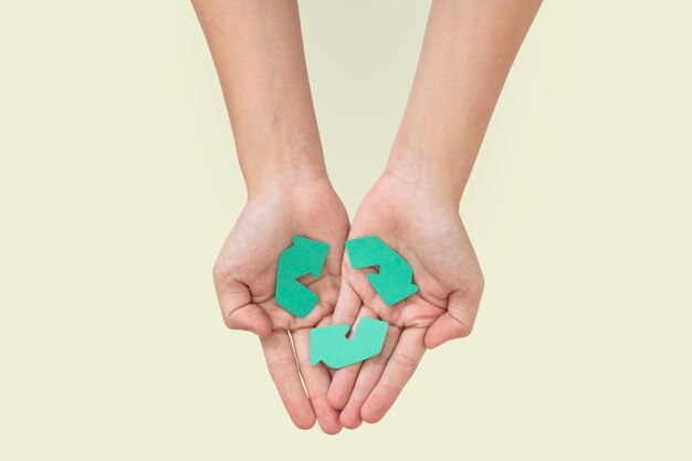 Hands cupping recycle  save the environment campaign