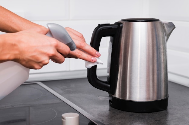 Hands disinfecting kettle