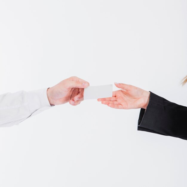 Hands exchanging business cards