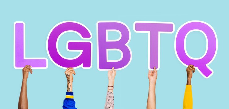 Free Photo hands holding the abbreviation lgbtq