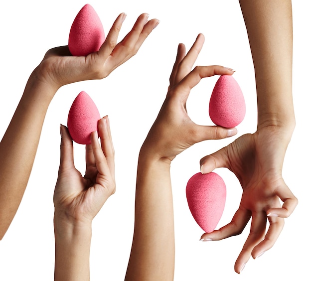 Hands holding a bright makeup sponge