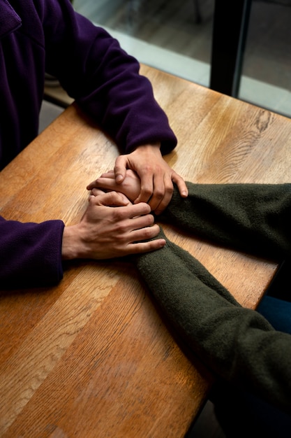 Free Photo hands holding each other for support