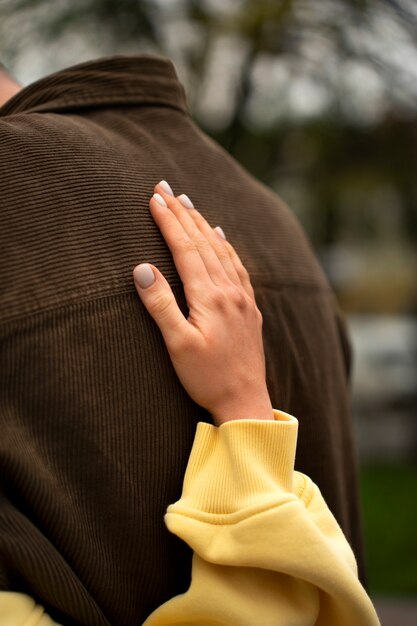 Hands holding eachother for support