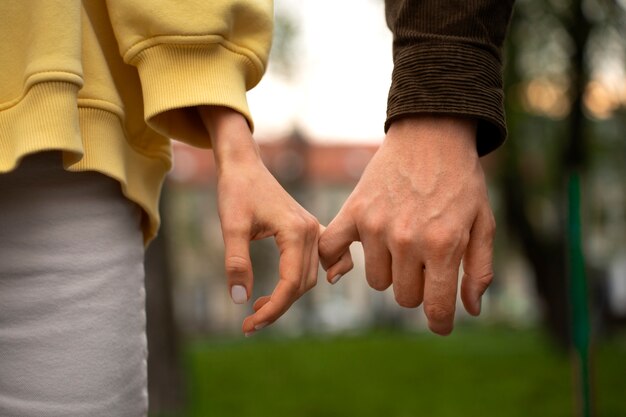Hands holding eachother for support