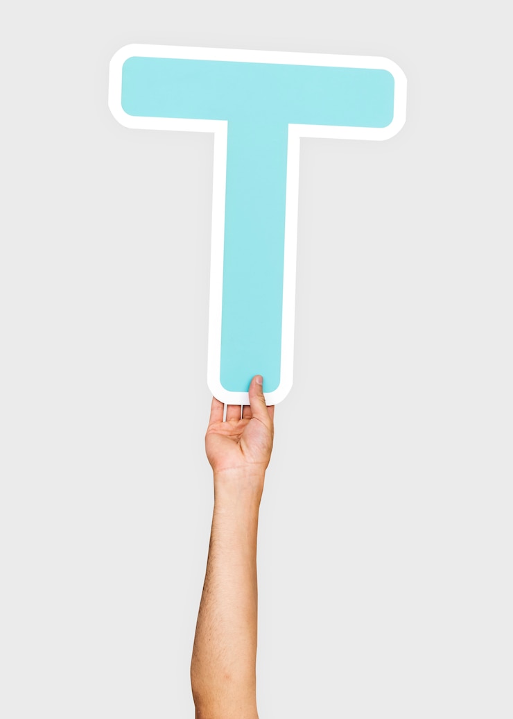 Free Photo hands holding the letter t