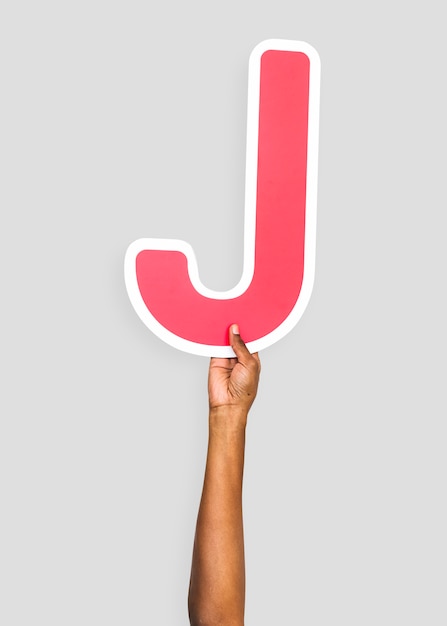 Бесплатное фото Руки, держащие букву j