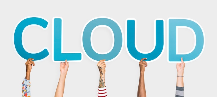 Free Photo hands holding up blue letters forming the word cloud