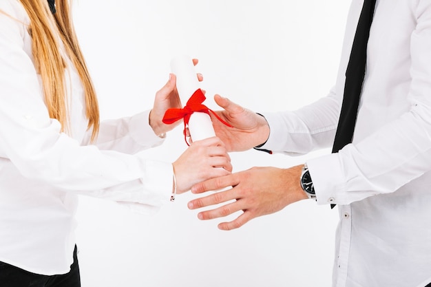 Hands of people with diploma