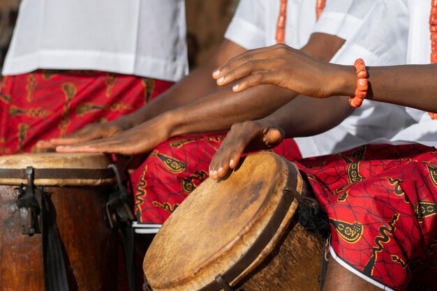 Hands playing drums close up