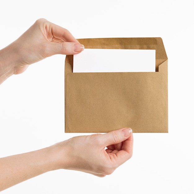 Hands showing envelope