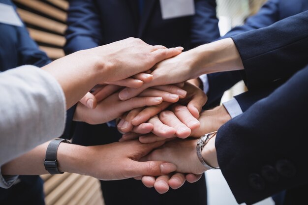 hands stack of business people