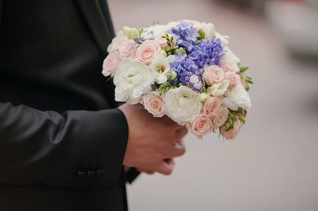 Hands with a bouquet