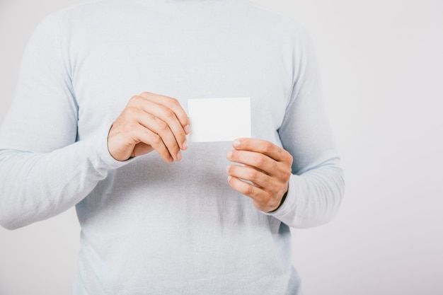 Hands with business card