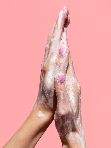 Hands with foam from soap