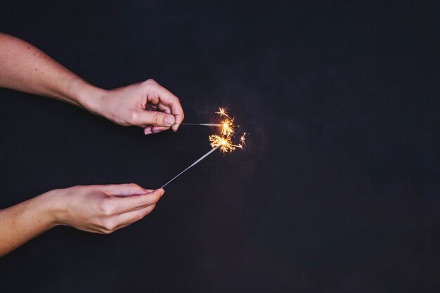Hands with sparklers