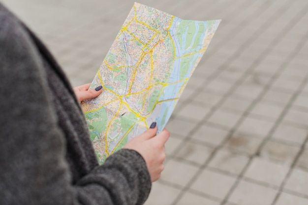 Hands of woman with map