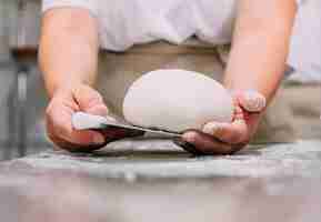 Free photo hands working in bake shop