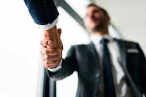 Free photo handshake business men concept