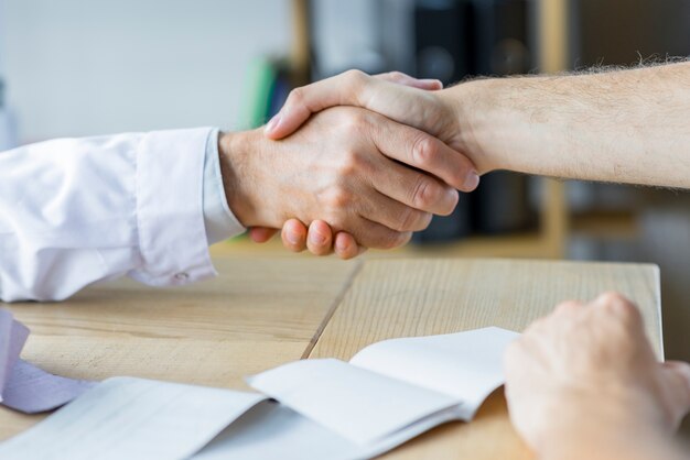 Handshake of doctor and patient