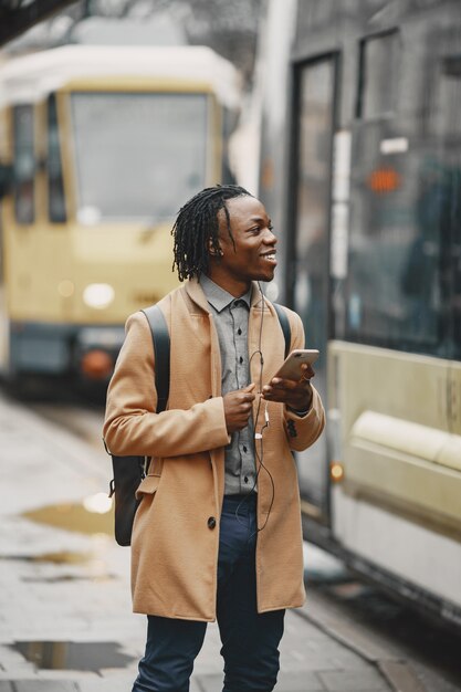 Handsome Afro American man in a autumn city