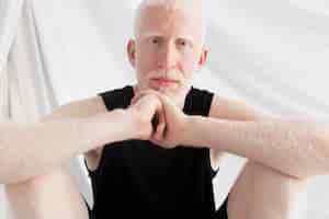 Free photo handsome albino man posing