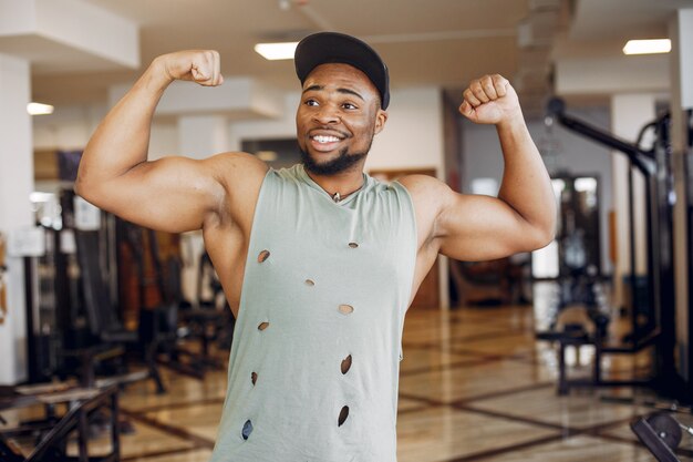 A handsome black man is engaged in a gym