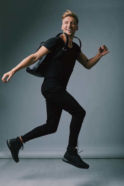 Handsome blond young man posing at studio