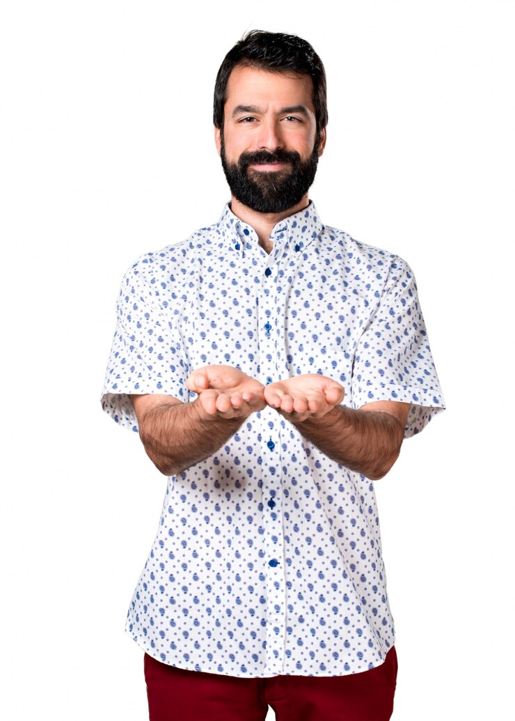 Free Photo handsome brunette man with beard holding something