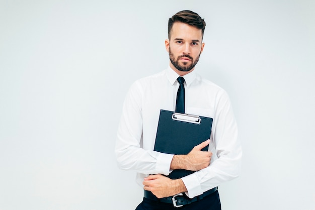 Handsome business guy with folder