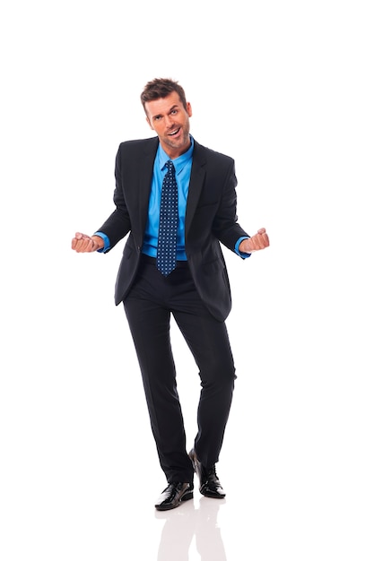 Handsome business man gesturing success sign