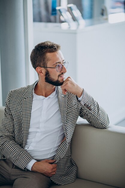 Handsome business man portrait in an office