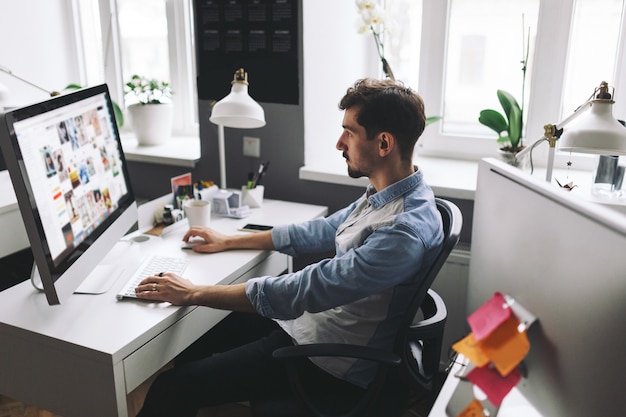 Handsome businessman working in office