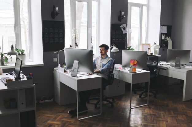 Handsome businessman working in office