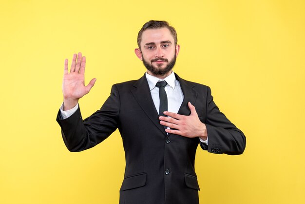 Handsome confident young man standing smiling