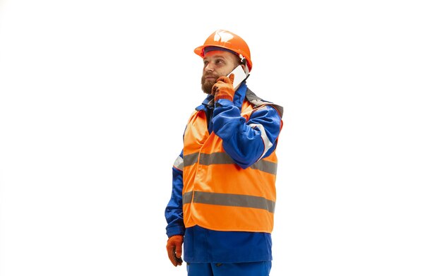 Handsome contractor, builder isolated over white studio.