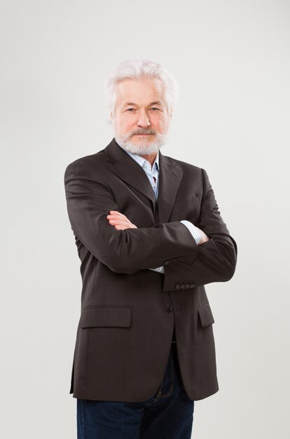 Handsome elderly businessman in suit