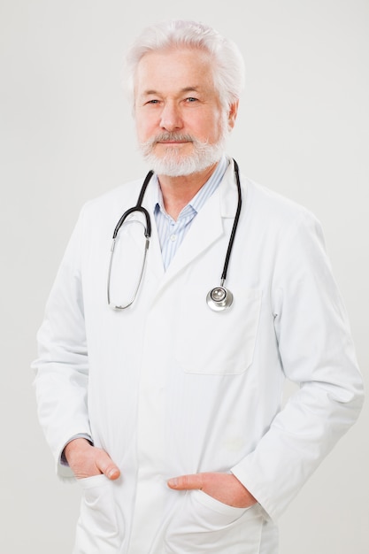 Handsome elderly doctor in uniform