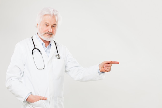 Handsome elderly doctor in uniform