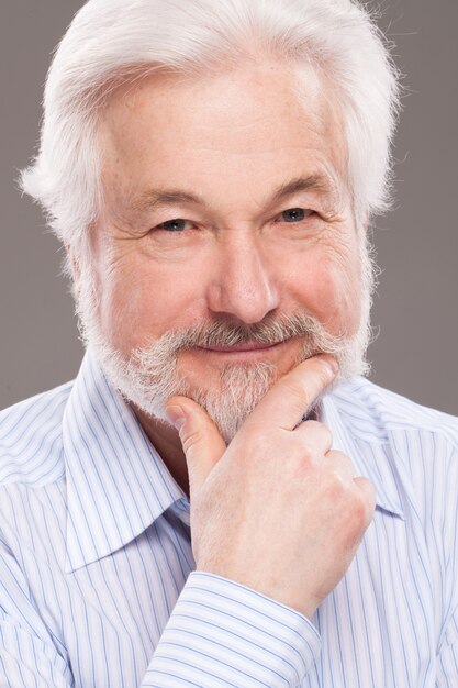 Handsome elderly man with grey beard