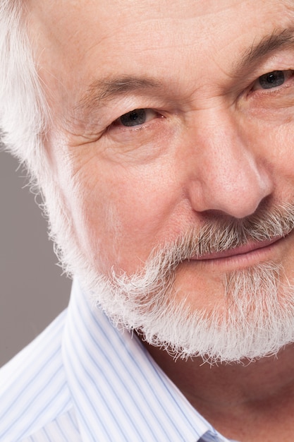 Handsome elderly man with grey beard